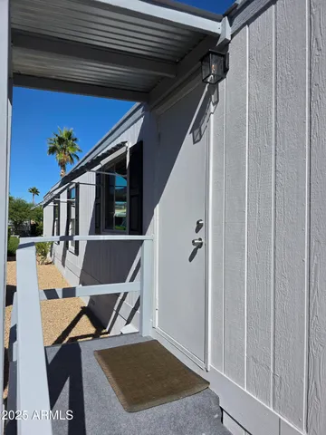 a view of a house with backyard and garden
