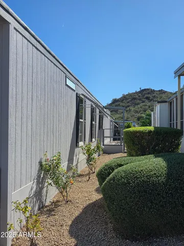 a view of a chairs and tables in the patio