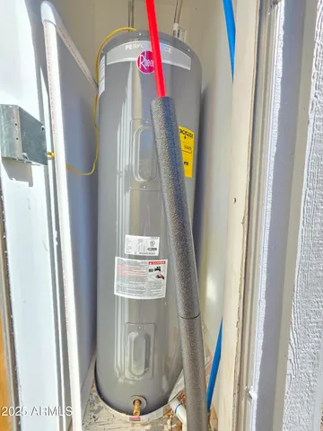 a sign that is sitting on a rock