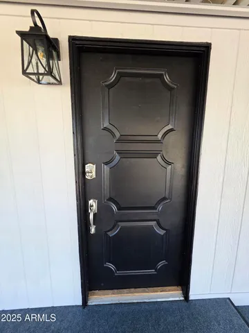 a view of entryway with a front door