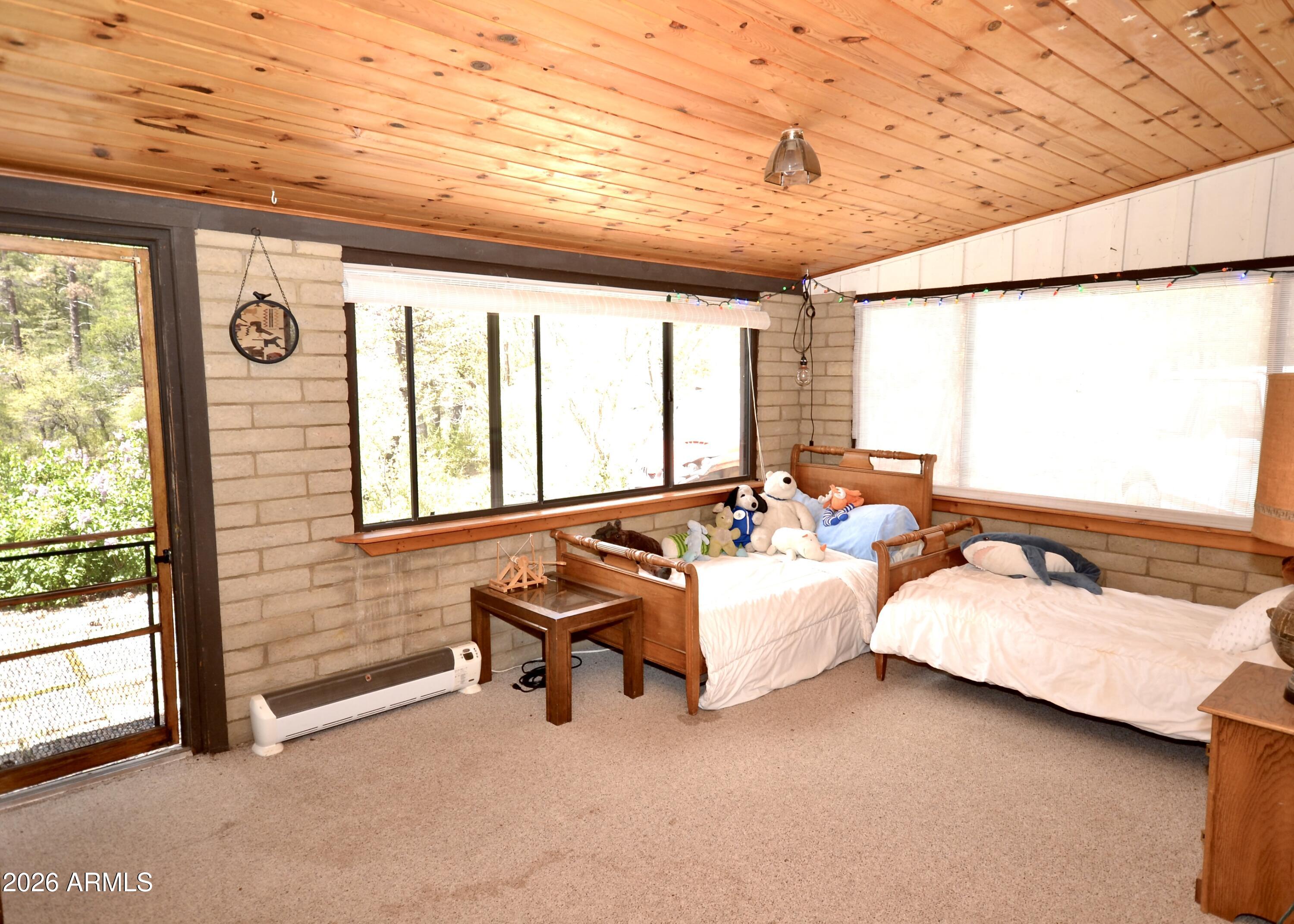 23617 South Demascus Road Crown King, AZ 86343 - Photo 29 of 50 a bedroom with furniture and windows