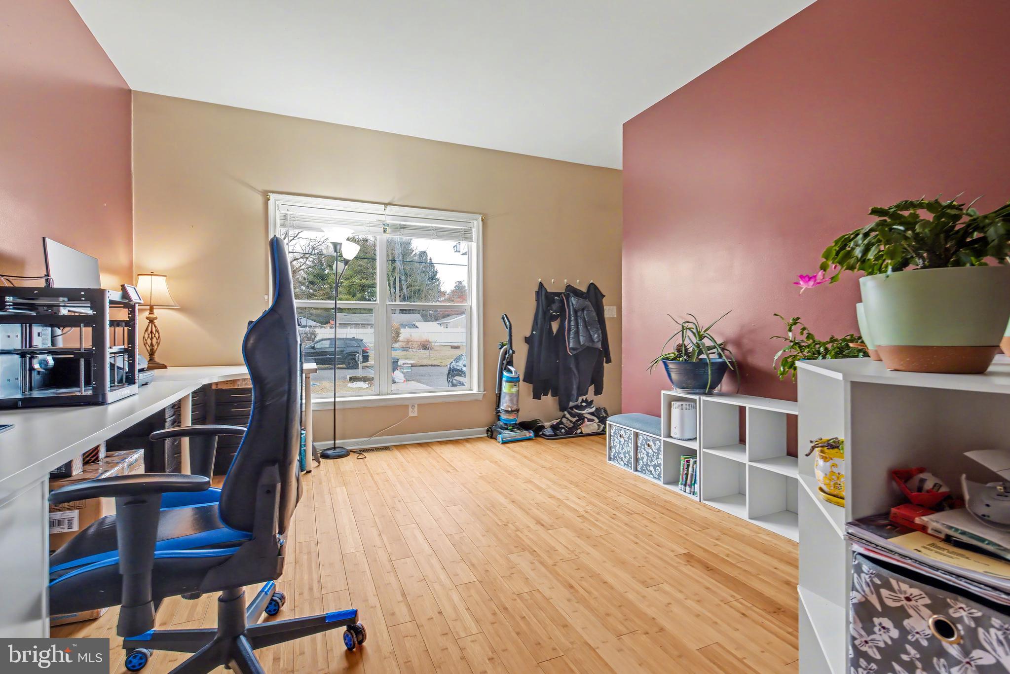 215 Birch Street Hamilton, NJ 08610 - Photo 17 of 38 a bed room with a bed and a chair