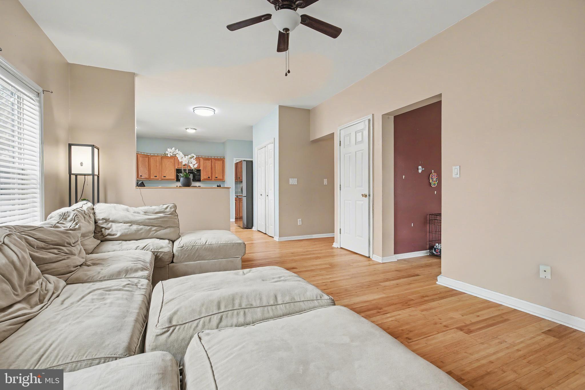 215 Birch Street Hamilton, NJ 08610 - Photo 24 of 38 a living room with furniture and a ceiling fan