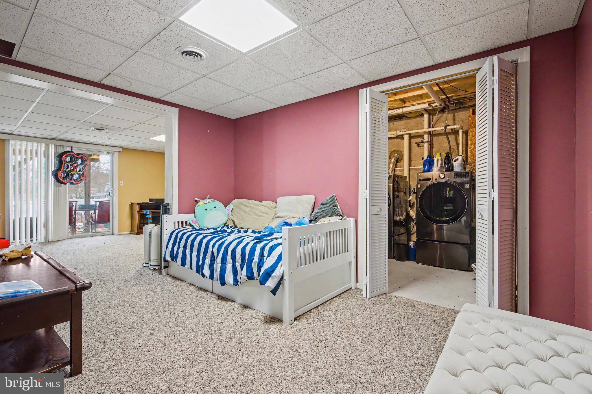 215 Birch Street Hamilton, NJ 08610 - Photo 27 of 38 a bedroom with furniture and a rug