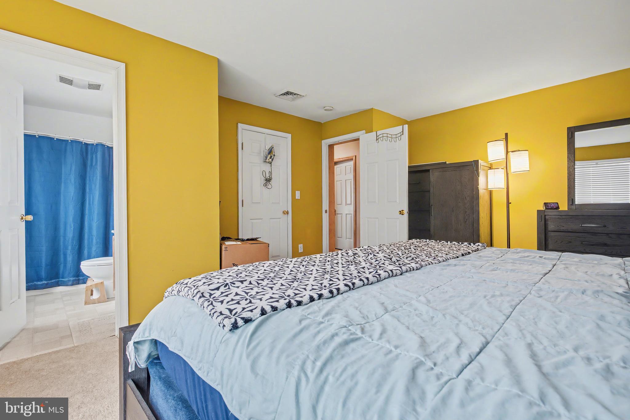 215 Birch Street Hamilton, NJ 08610 - Photo 33 of 38 a bedroom with a bed and dresser