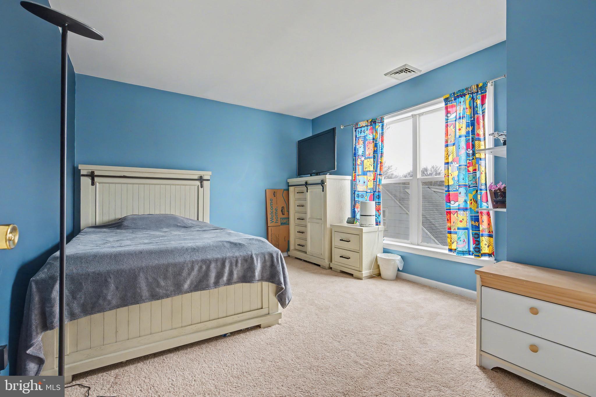 215 Birch Street Hamilton, NJ 08610 - Photo 7 of 38 a bedroom with a bed and a window