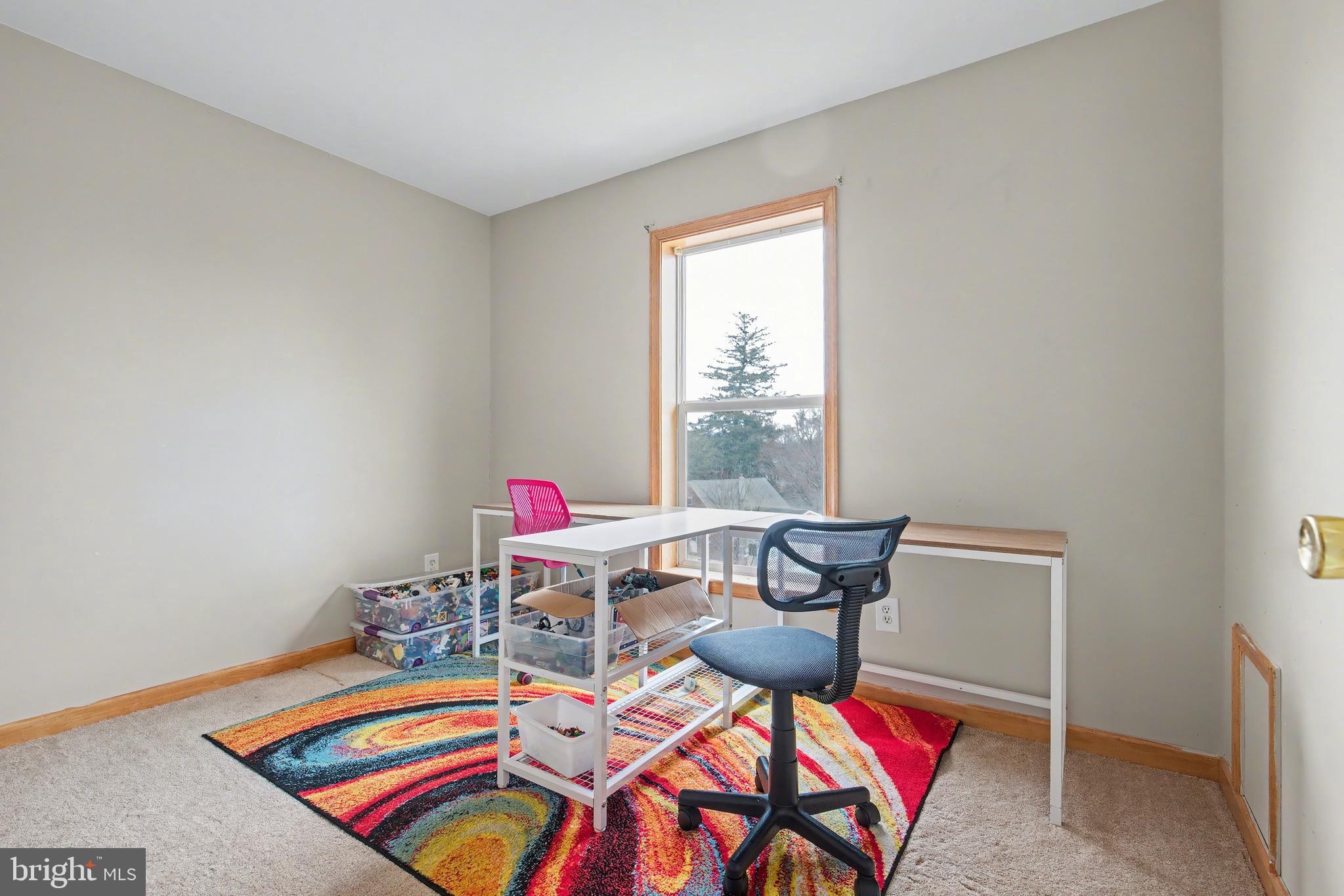 215 Birch Street Hamilton, NJ 08610 - Photo 9 of 38 a room with furniture and a wooden floor