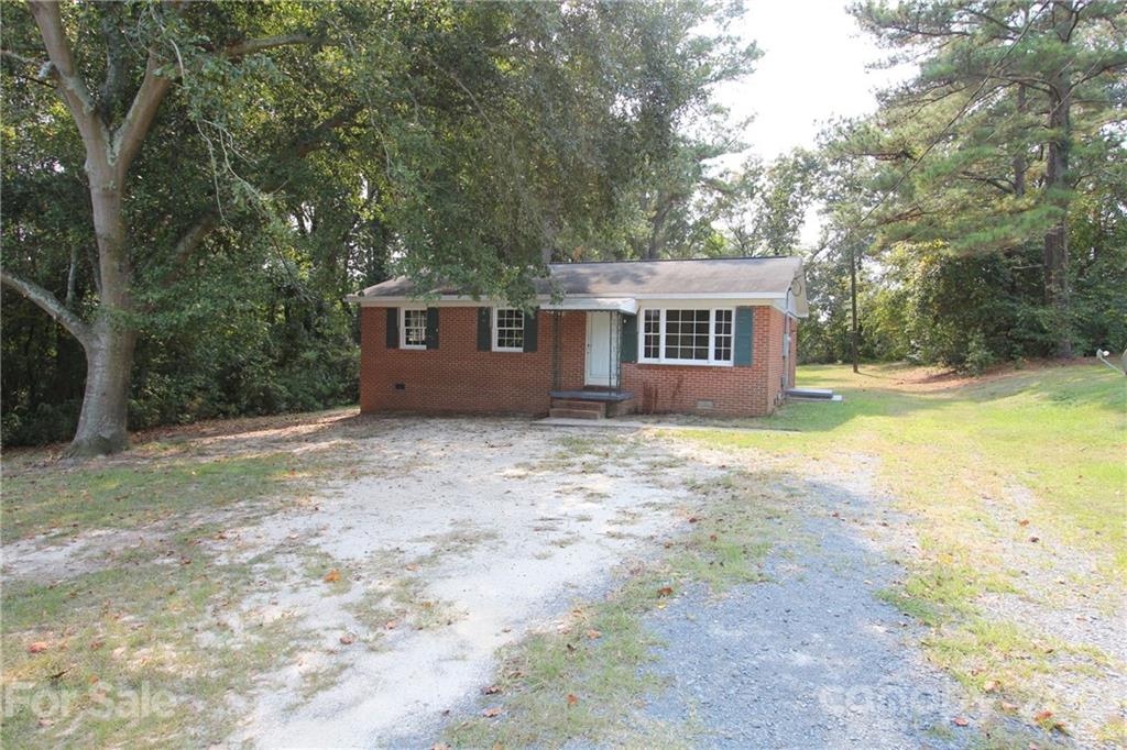 79 Short Town Road Morven, NC 28119 - Photo 2 of 18 a view of house with outdoor space and garden