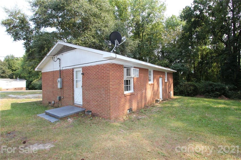 79 Short Town Road Morven, NC 28119 - Photo 3 of 18 a view of a house with backyard