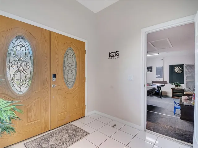 a view of living room filled with furniture and a table