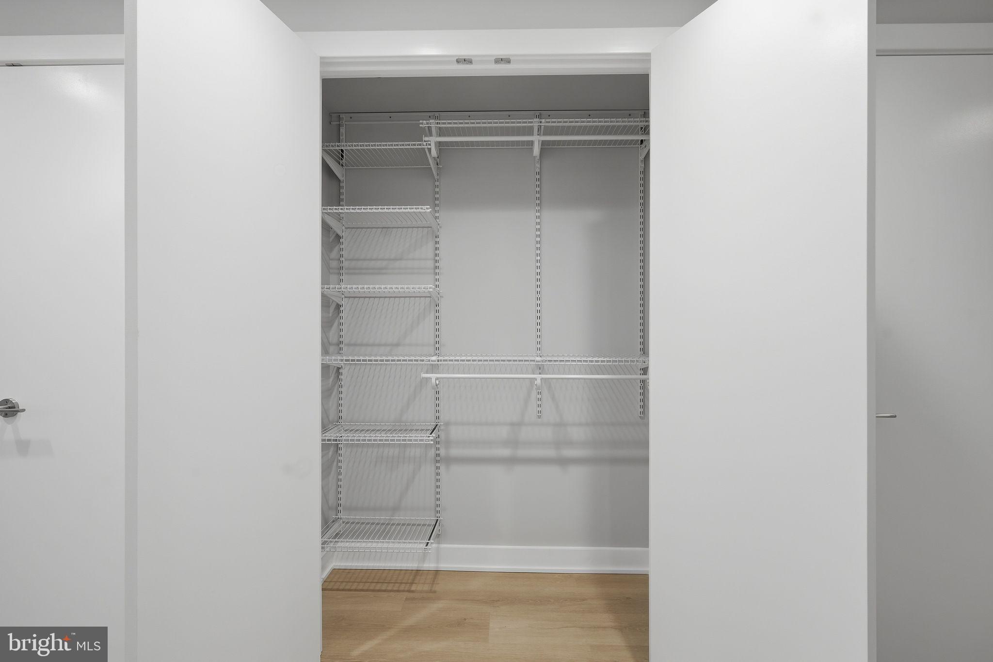 950 3rd Street Northwest, Unit 1009 Washington, DC 20001 - Photo 28 of 32 a view of walk in closet with empty racks