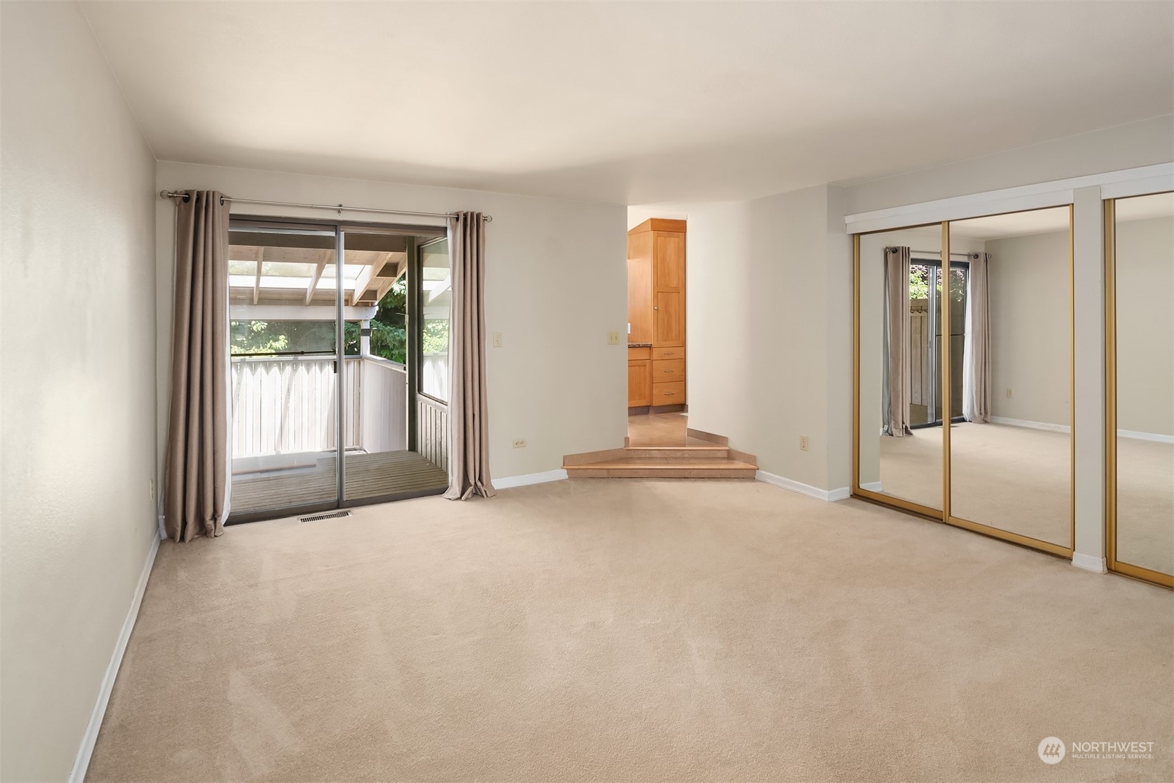 15412 Southeast 176th Place Renton, WA 98058 - Photo 5 of 6 an empty room with windows and closet