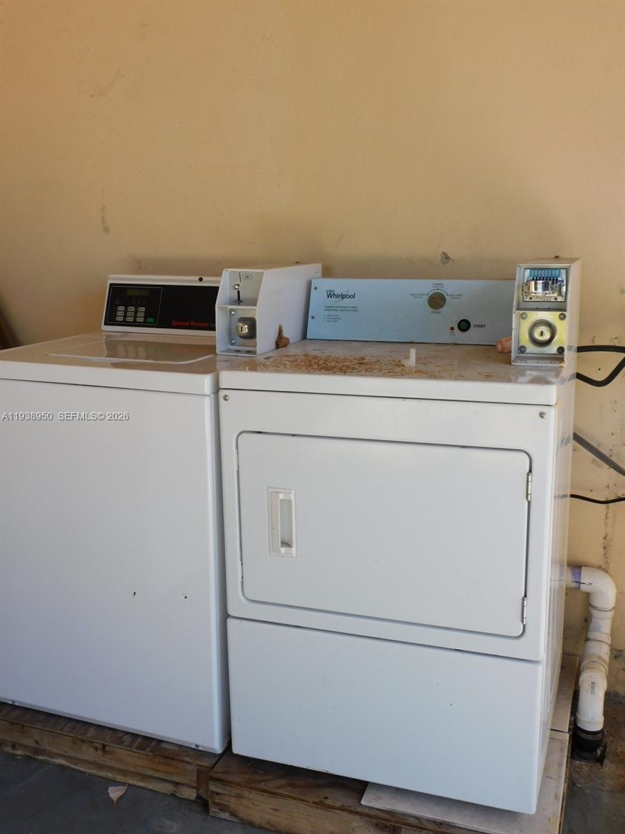 846 West 31st Street Hialeah, FL 33012 - Photo 17 of 21 Coined operated washer and dryer at rear covered patio.
