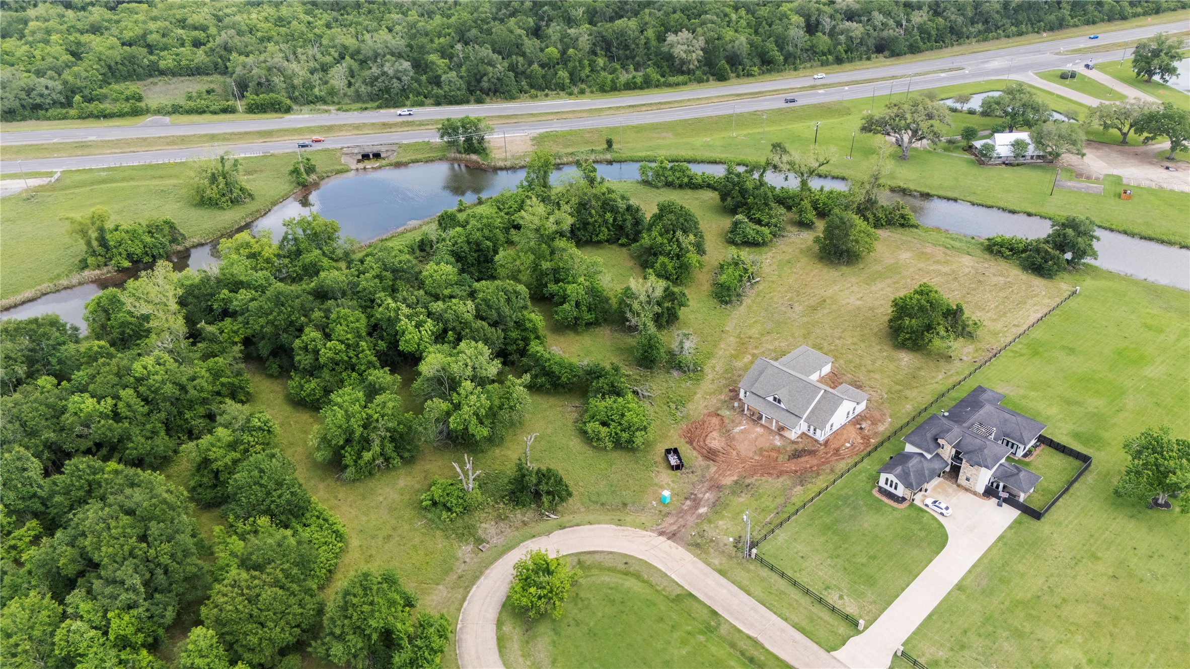 1127 Saddlehorn Bend Angleton, TX 77515 - Photo 11 of 23 an aerial view of a house with a yard basket ball court and outdoor seating