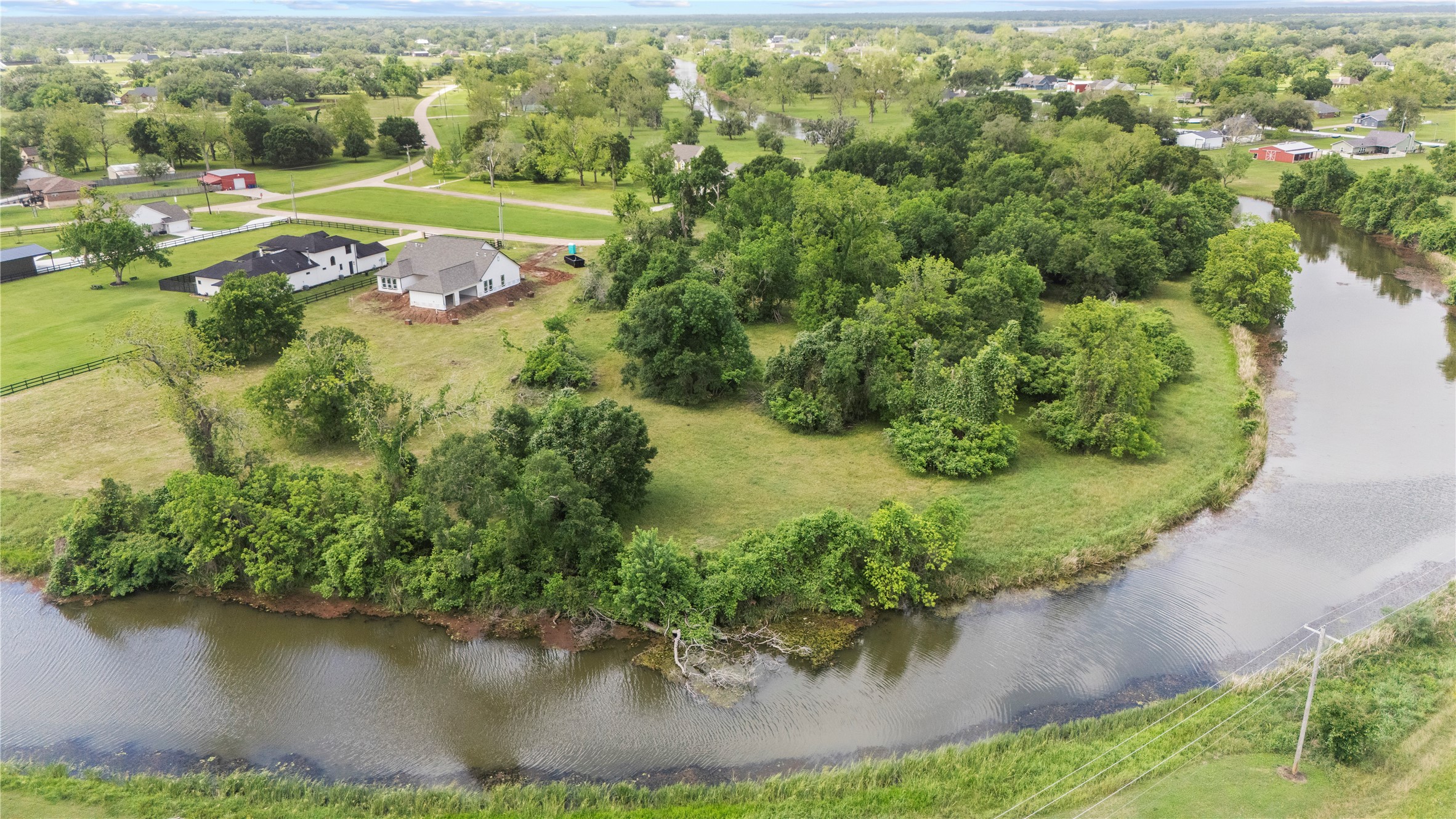 1127 Saddlehorn Bend Angleton, TX 77515 - Photo 3 of 23 an aerial view of a house with a yard and outdoor seating