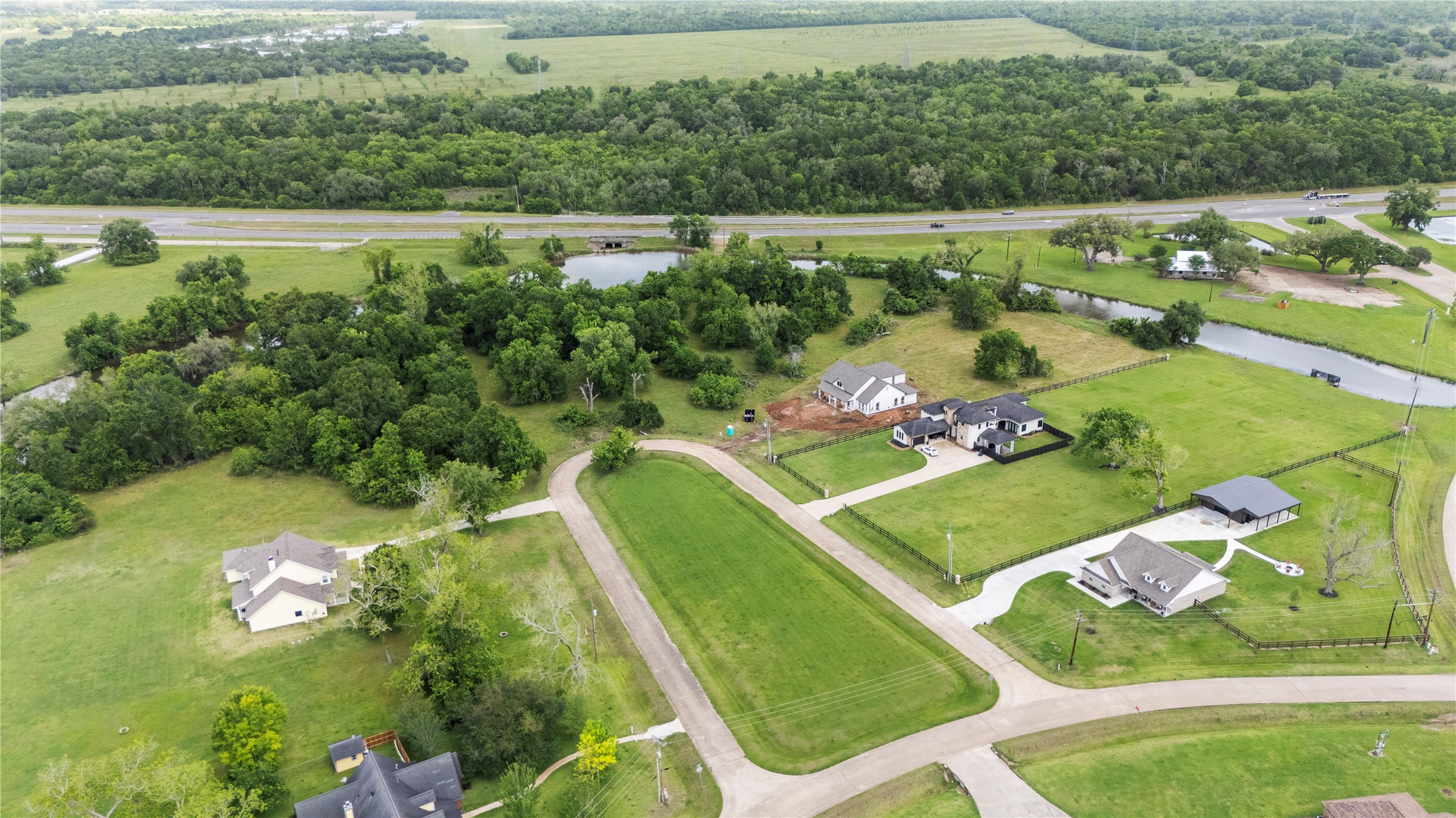 1127 Saddlehorn Bend Angleton, TX 77515 - Photo 5 of 23 an aerial view of a golf course with chairs