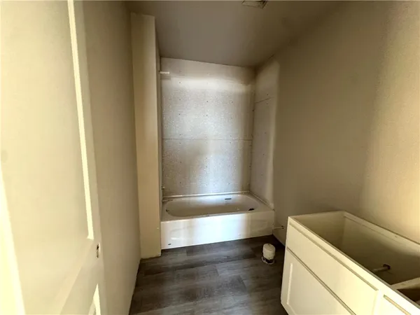 a bathroom with a bathtub