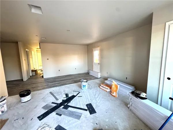 a room with furniture and air hockey table