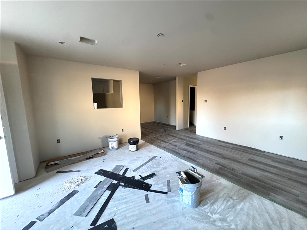 216 Melissa Street Eddy, TX 76524 - Photo 6 of 14 a living room with furniture and a flat screen tv