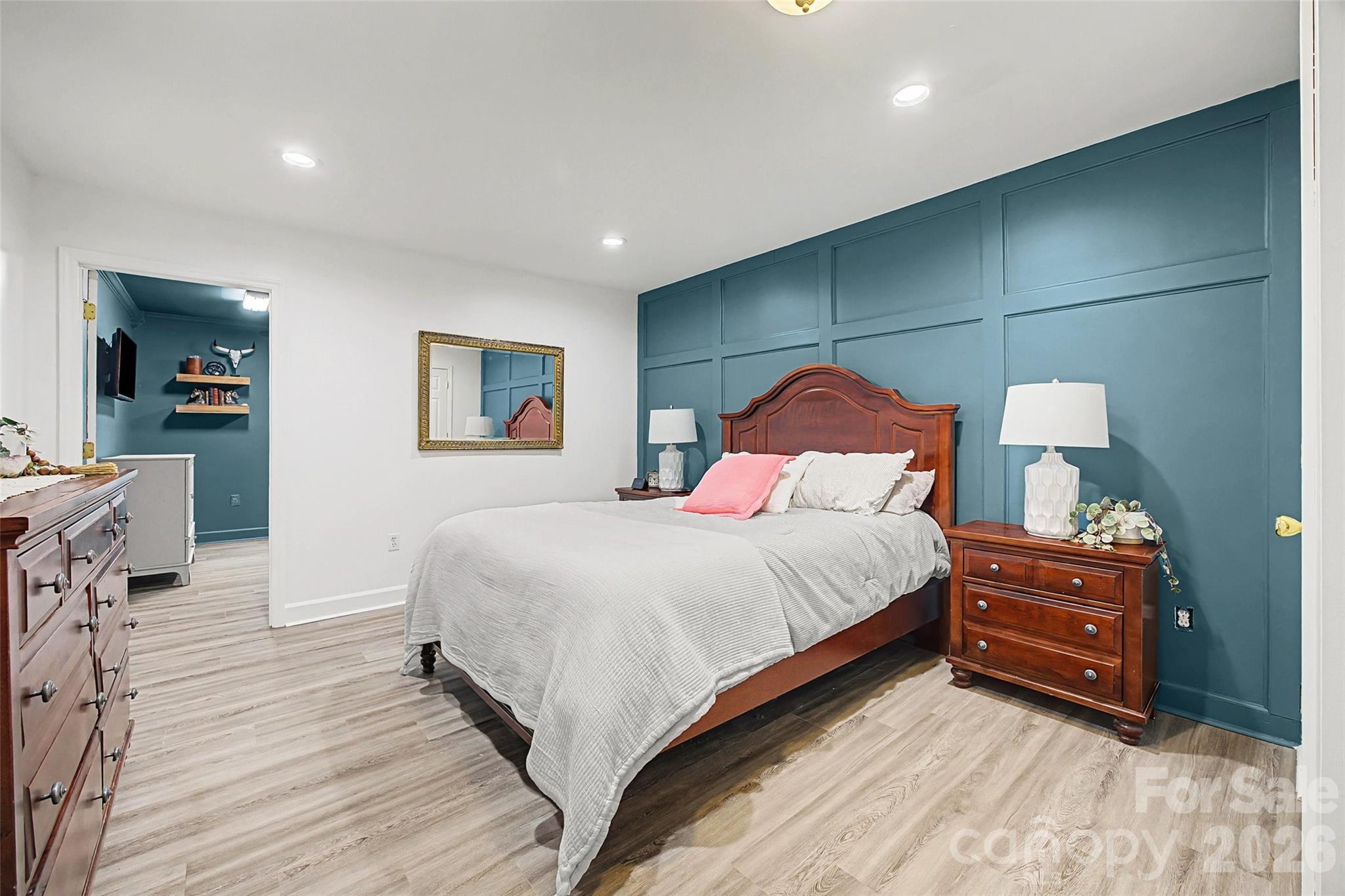 6396 Crosswinds Drive Clover, SC 29710 - Photo 33 of 47 a bedroom with a bed and a mirror
