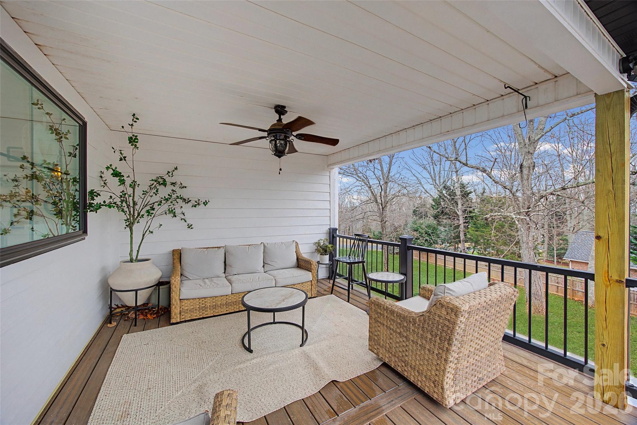 6396 Crosswinds Drive Clover, SC 29710 - Photo 42 of 47 a living room with furniture and a potted plant
