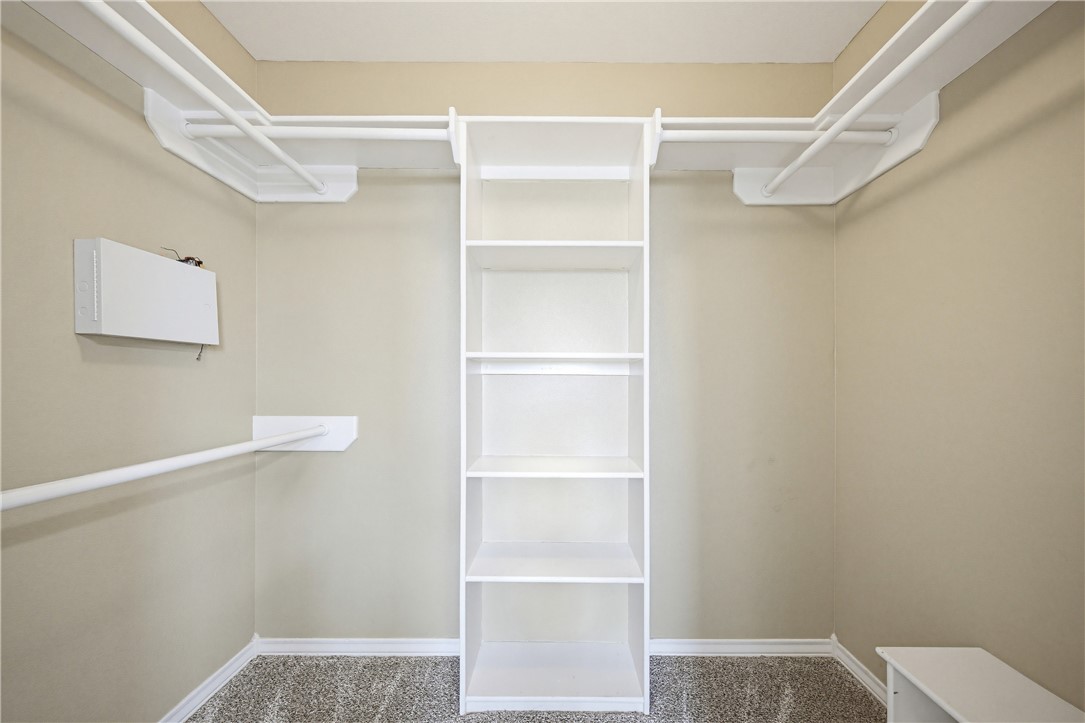 7251 Prairie Drive, Unit 6 Corpus Christi, TX 78413 - Photo 25 of 28 a view of an empty walk in closet