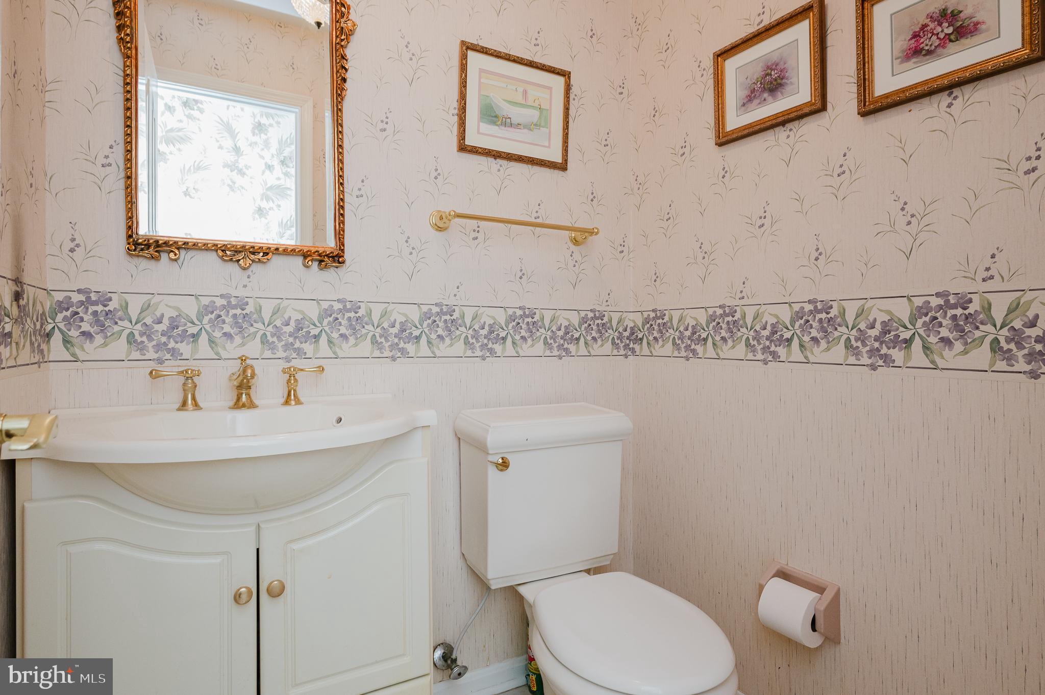 1303 Mill Creek Road Fallston, MD 21047 - Photo 11 of 58 a bathroom with a sink mirror and toilet
