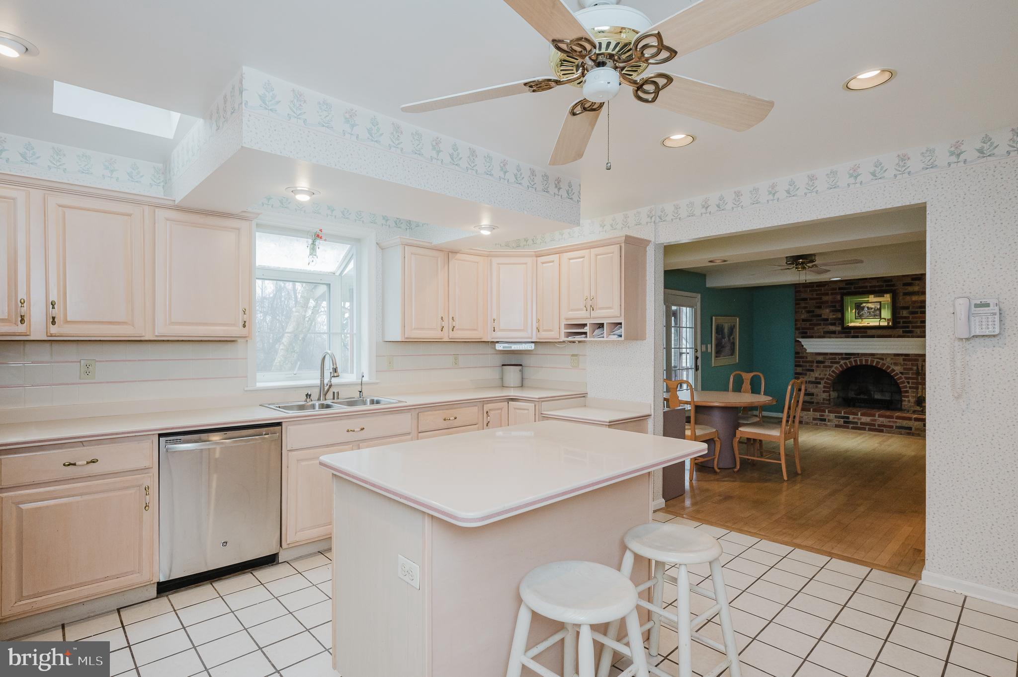 1303 Mill Creek Road Fallston, MD 21047 - Photo 17 of 58 a kitchen with a sink cabinets and wooden floor