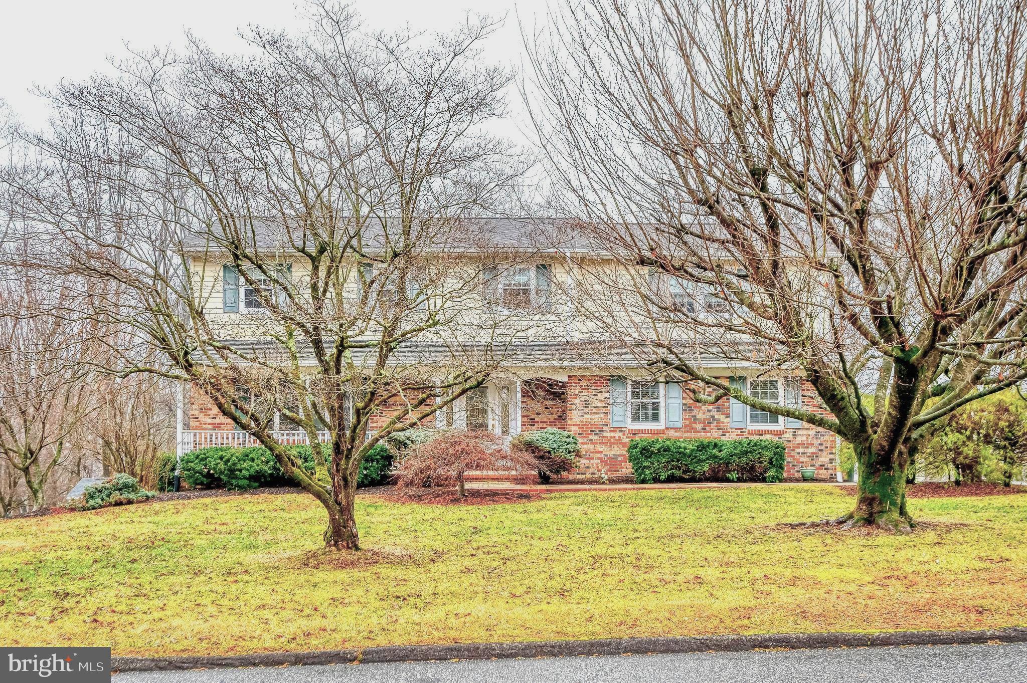 1303 Mill Creek Road Fallston, MD 21047 - Photo 3 of 58 a front view of a house with a yard