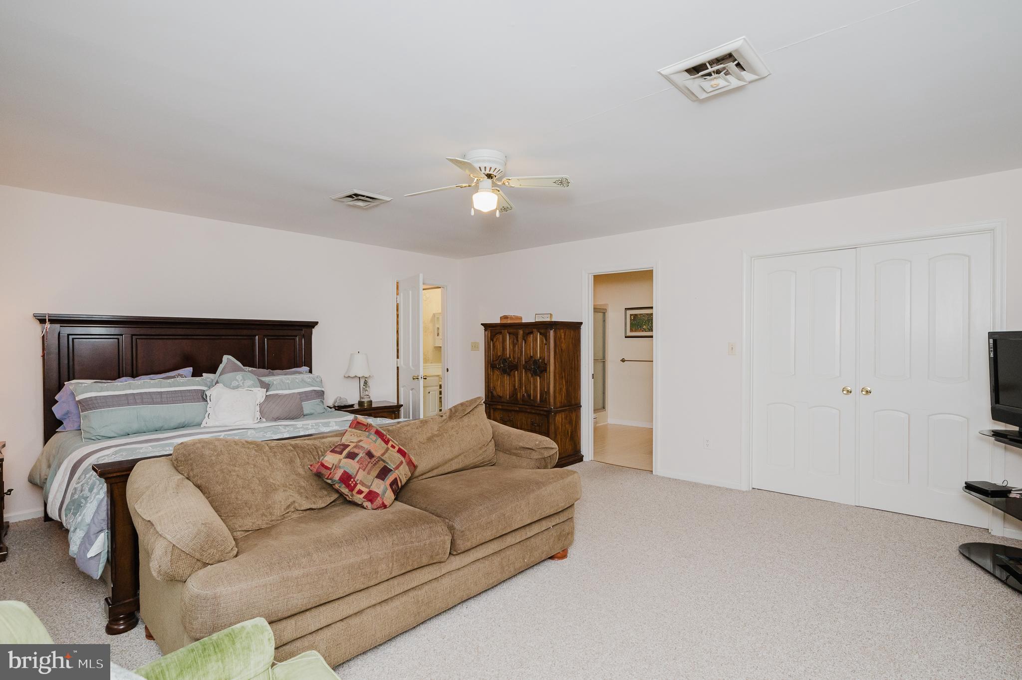 1303 Mill Creek Road Fallston, MD 21047 - Photo 31 of 58 a living room with furniture and a ceiling fan