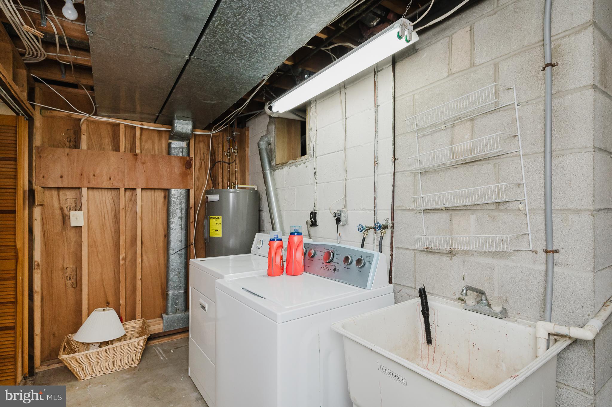 1303 Mill Creek Road Fallston, MD 21047 - Photo 47 of 58 a bathroom with a sink toilet and shower