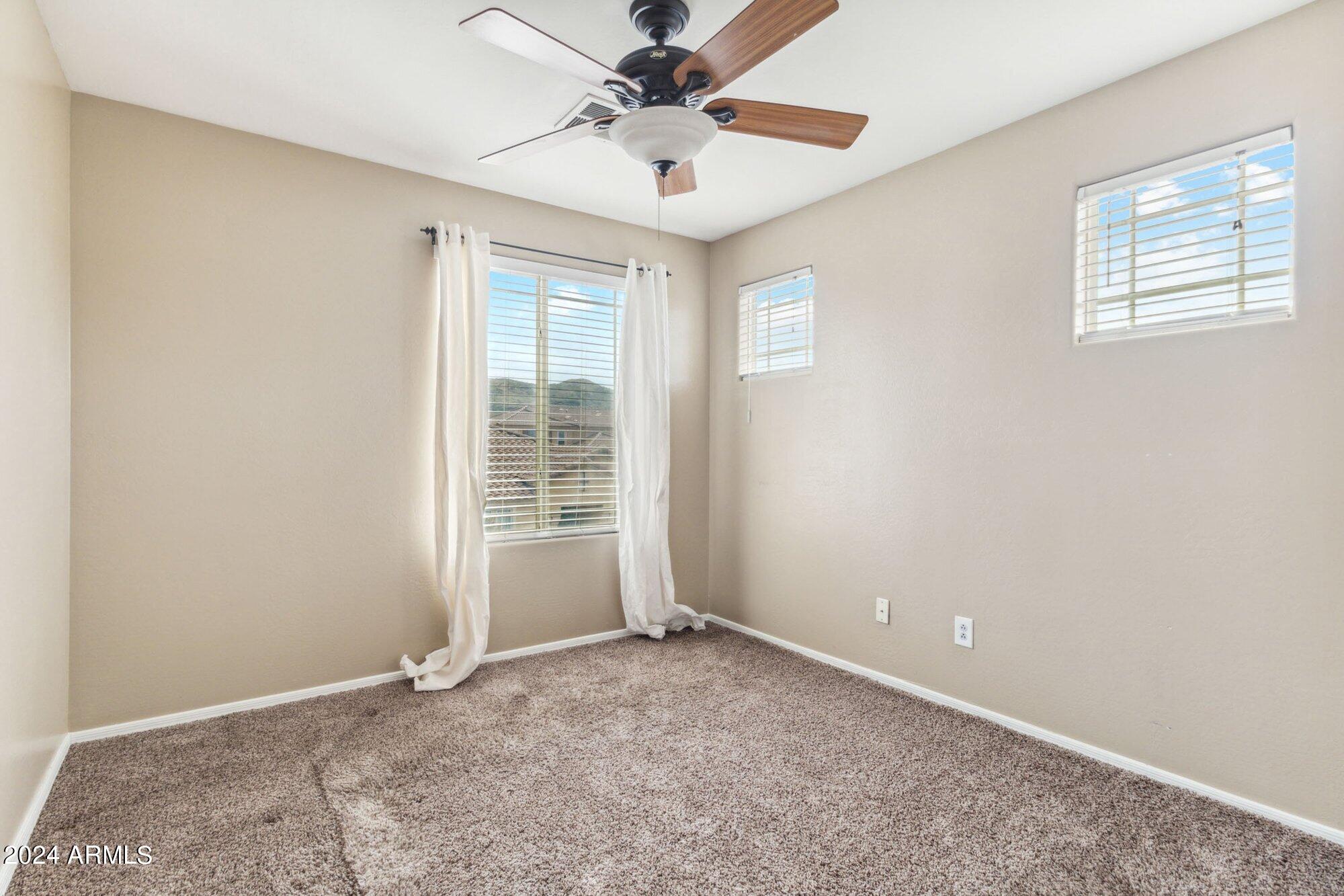 3910 East Pollack Street Phoenix, AZ 85042 - Photo 15 of 27 Secondary Bedroom Upstair is Split