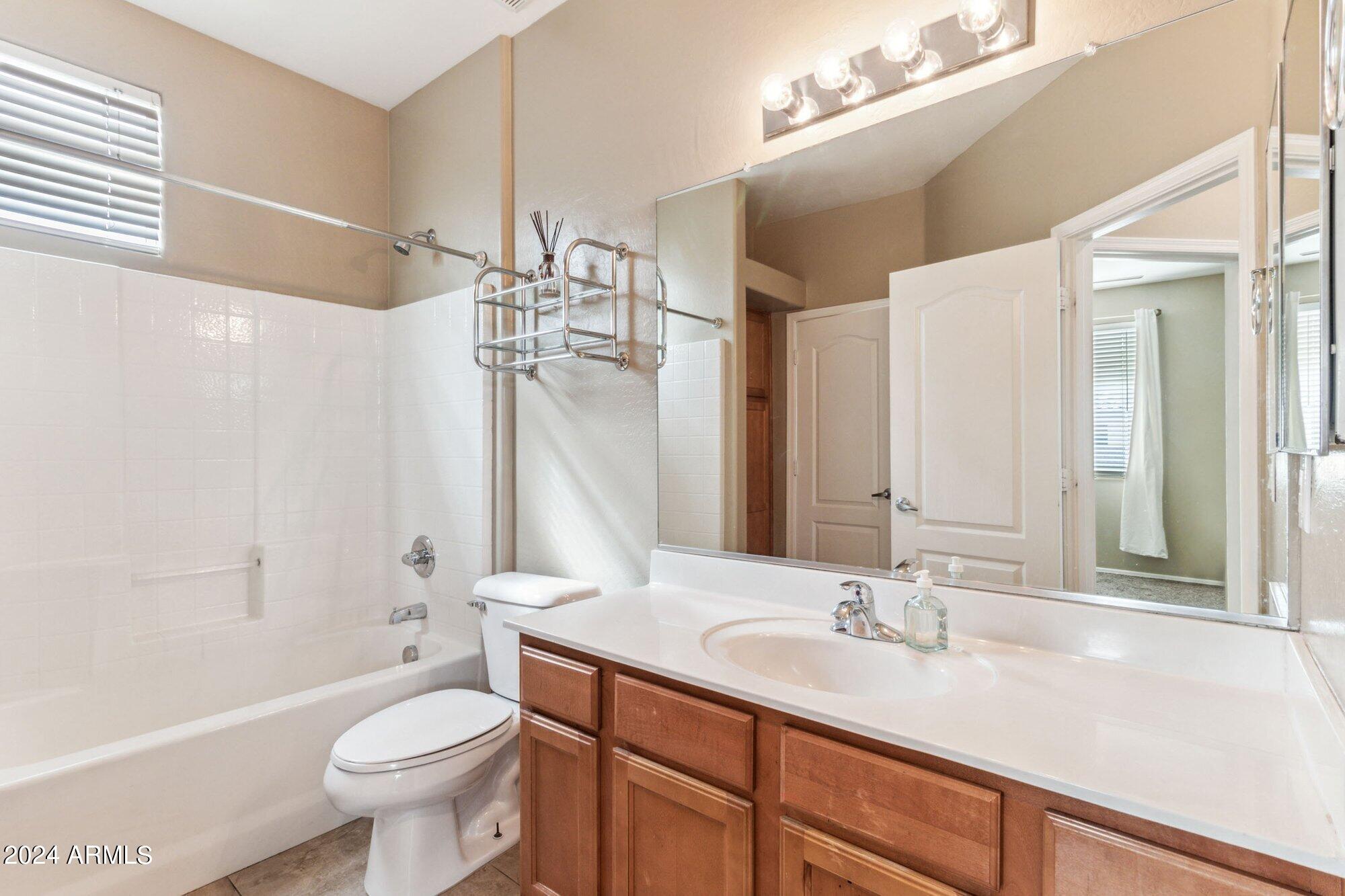 3910 East Pollack Street Phoenix, AZ 85042 - Photo 20 of 27 Downstairs Bath attached to Bedroom