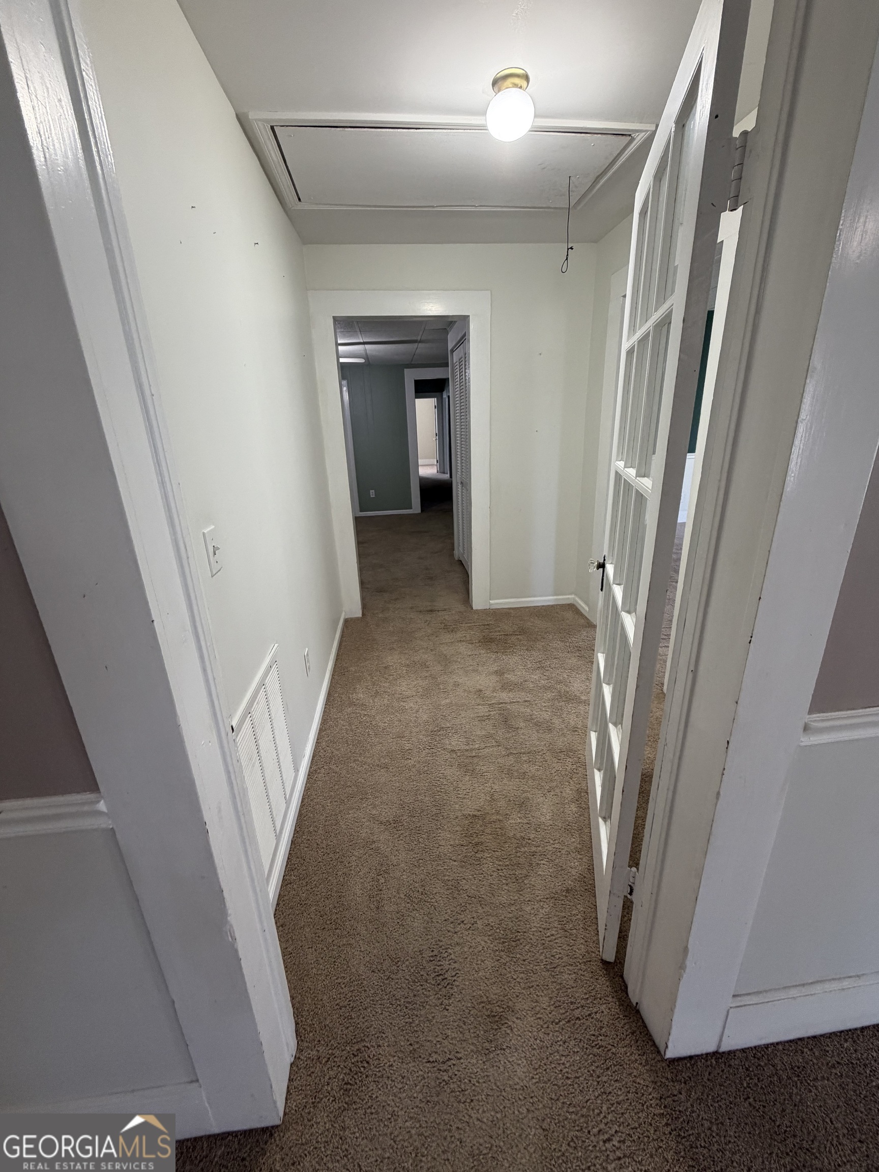 151 Tusten Street Elberton, GA 30635 - Photo 21 of 30 a view of a hallway view with staircase
