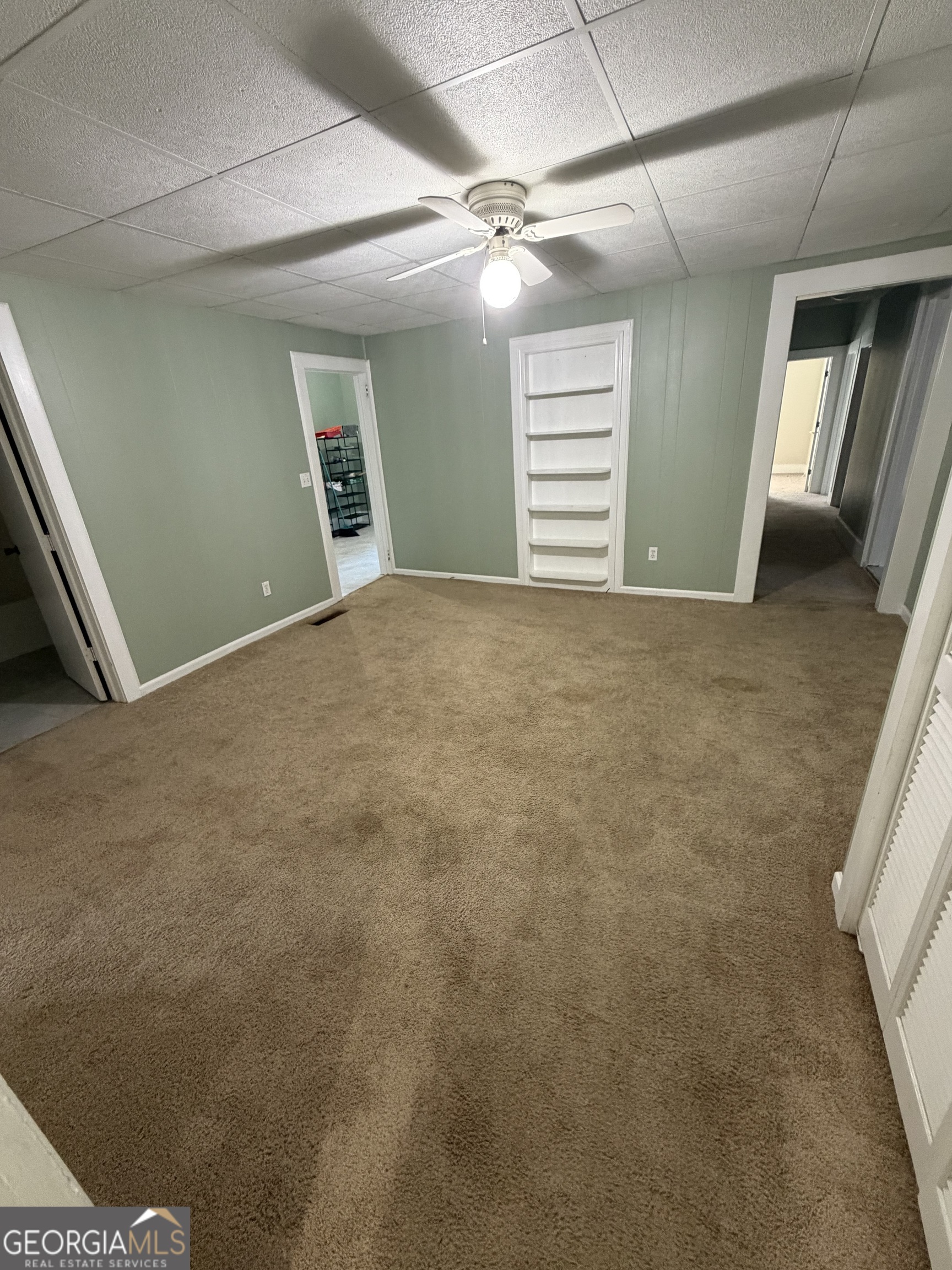 151 Tusten Street Elberton, GA 30635 - Photo 25 of 30 a view of an empty room with a fireplace