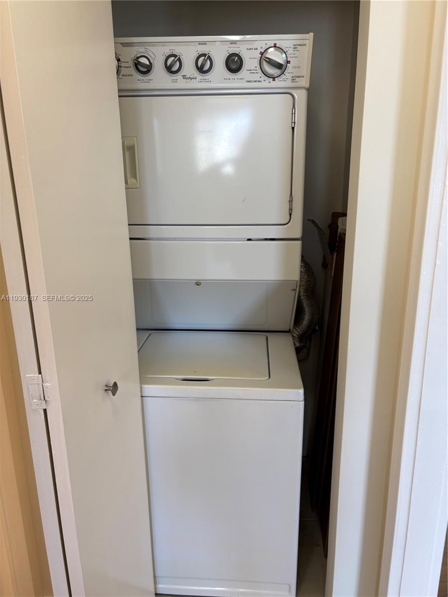 2775 Northeast 187th Street, Unit 628 Aventura, FL 33180 - Photo 8 of 19 a close view of washer and dryer