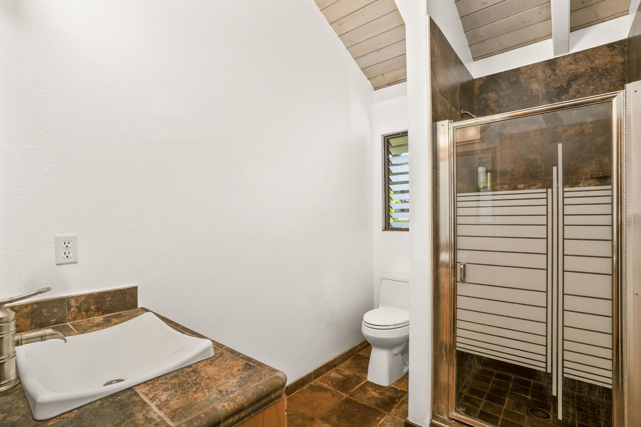 4485 Pilikoa Street Hanalei, HI 96714 - Photo 22 of 30 a bathroom with a toilet and a sink