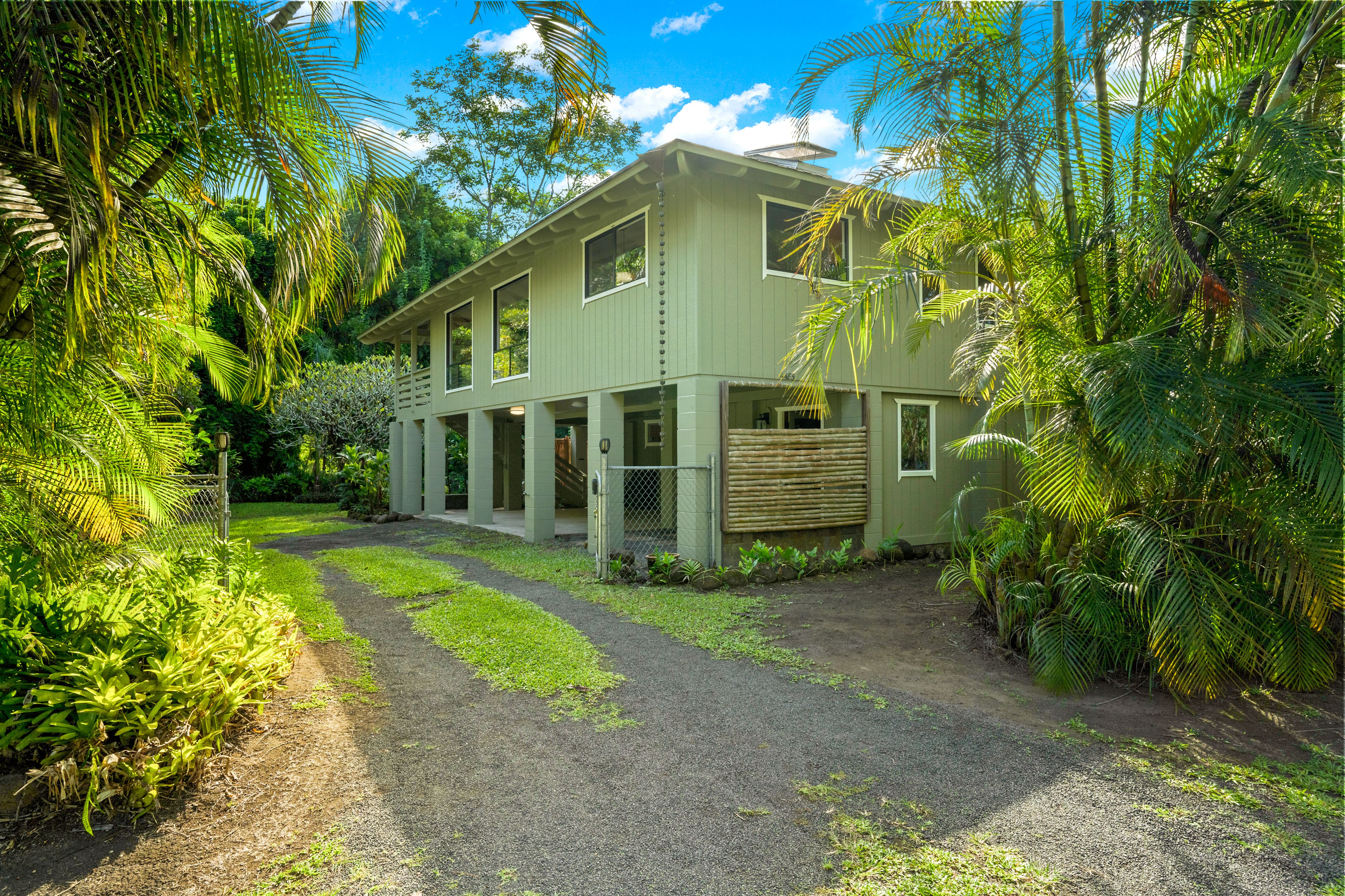 4485 Pilikoa Street Hanalei, HI 96714 - Photo 3 of 30 a view of a house with a yard