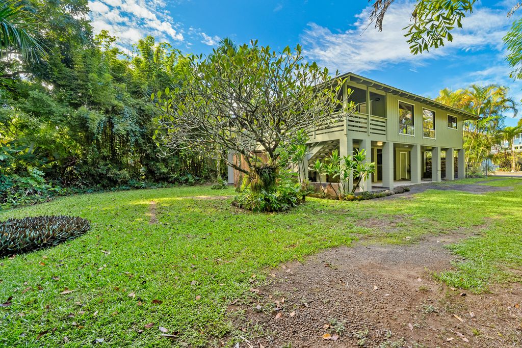 4485 Pilikoa Street Hanalei, HI 96714 - Photo 4 of 30 a view of a big building with a big yard and large trees