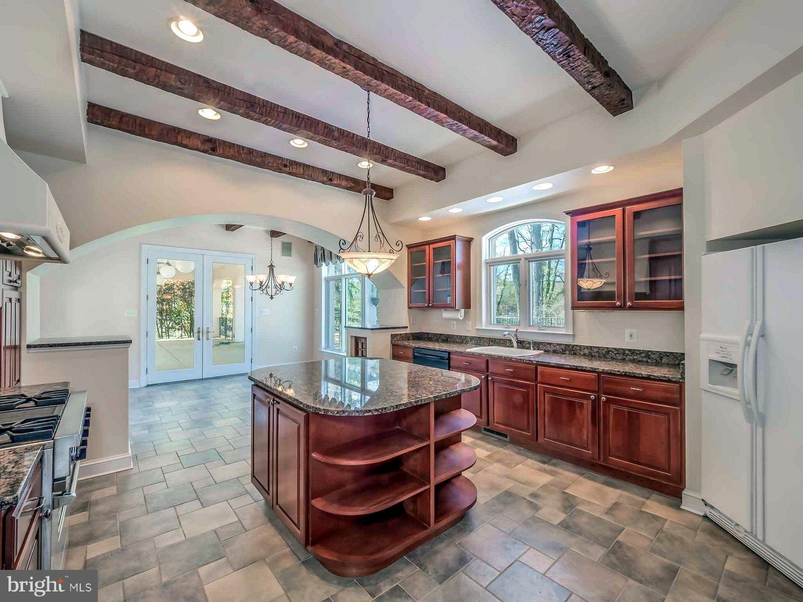 5825 Bayside Road St. Leonard, MD 20685 - Photo 11 of 30 Viking Stove,Granite, Island,Ceramic, Wood Beams