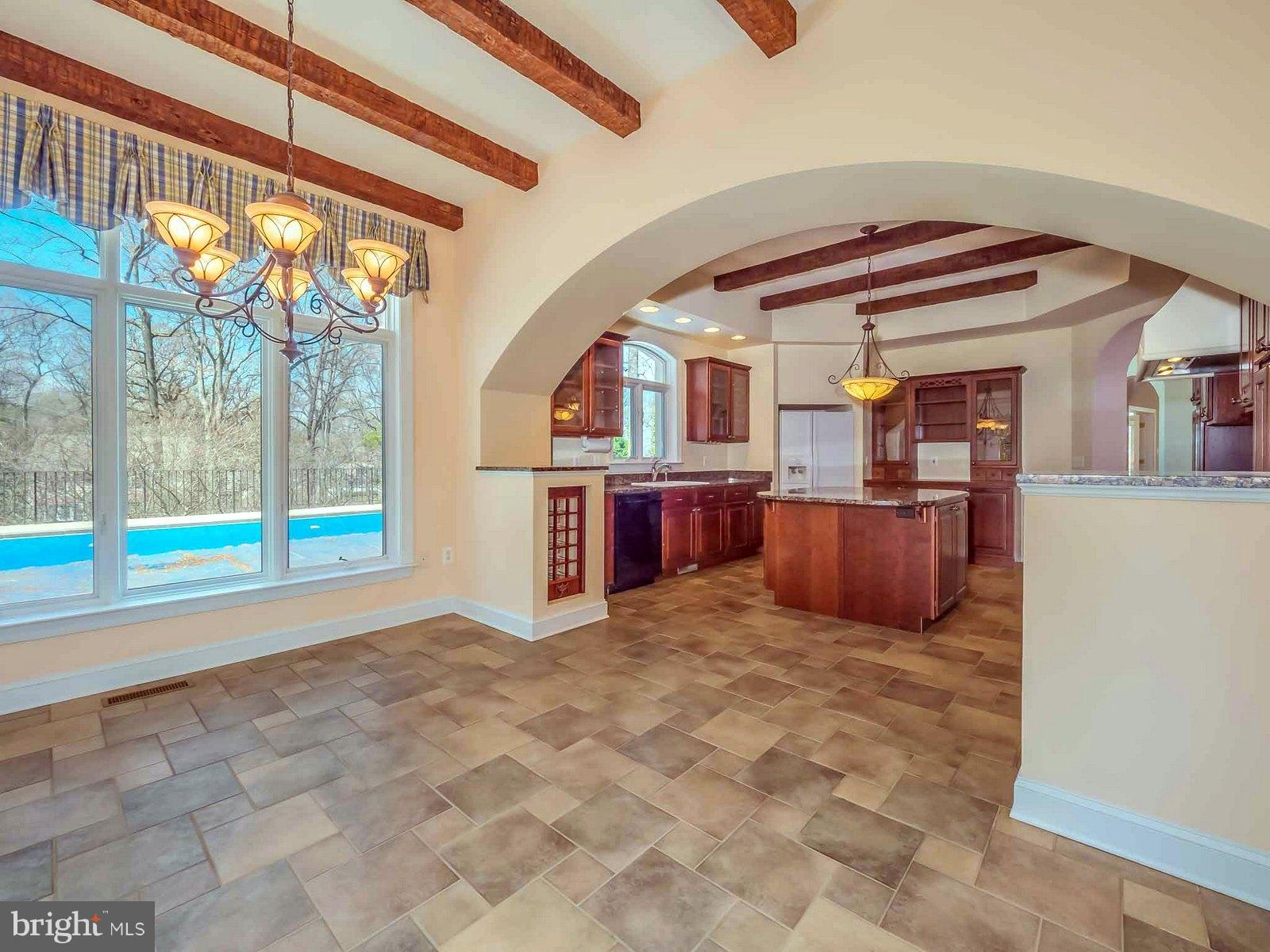 5825 Bayside Road St. Leonard, MD 20685 - Photo 12 of 30 Morning Rm w/ view of Pool, Hand Hewed wood Beams
