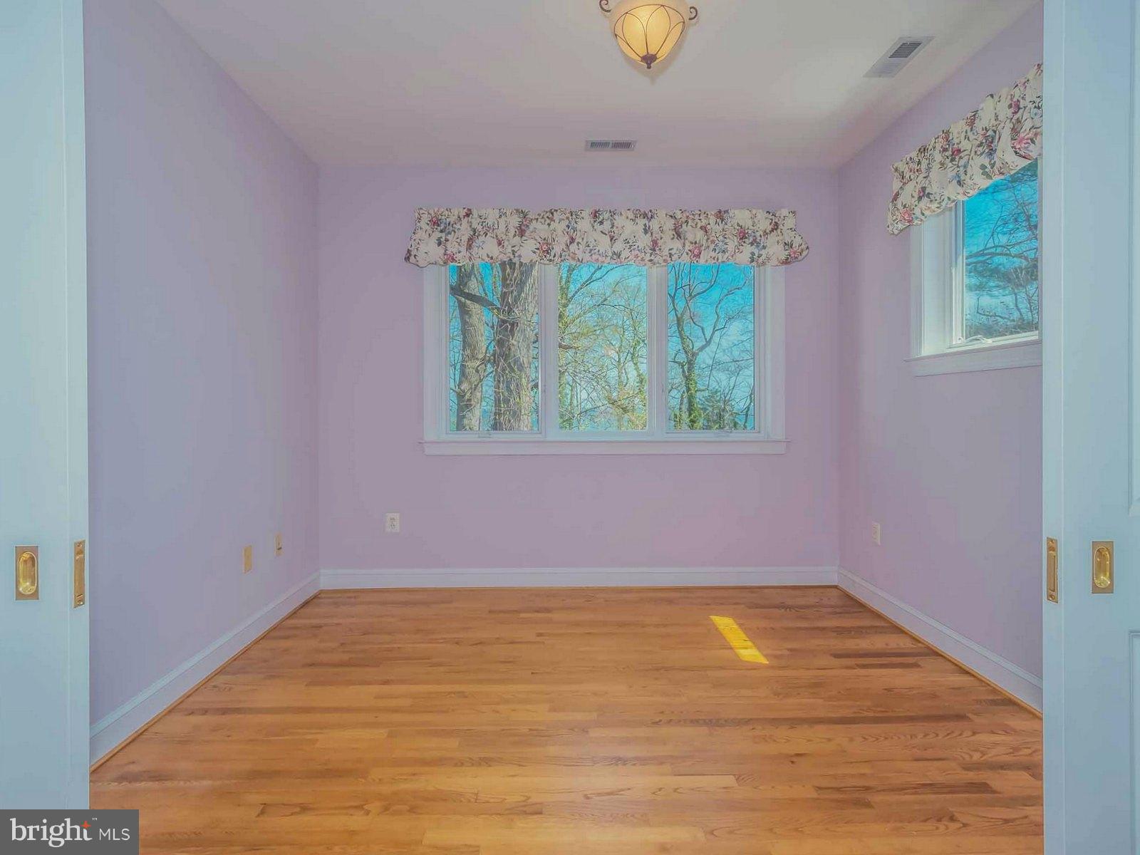 5825 Bayside Road St. Leonard, MD 20685 - Photo 18 of 30 BR 3 w/ water view, pocket doors, walk-in Closet