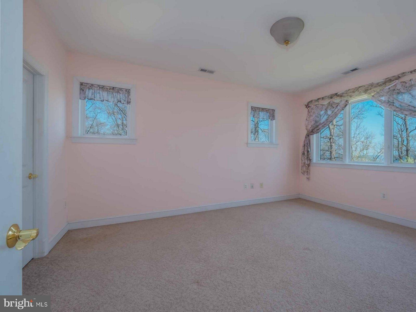 5825 Bayside Road St. Leonard, MD 20685 - Photo 22 of 30 Bedroom 5 w/ Water view & Walk-In Closet