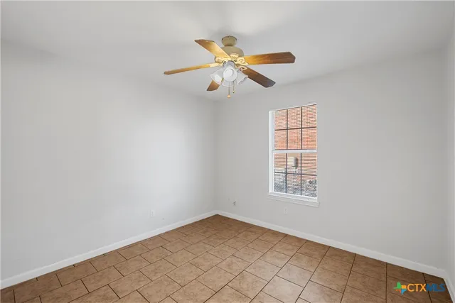 a view of room with wooden floor