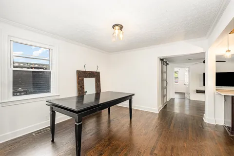 a view of workspace with wooden floor