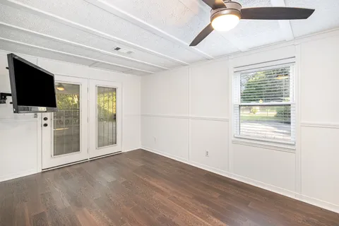 a view of a livingroom with a flat screen tv