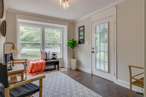 a view of a livingroom with furniture