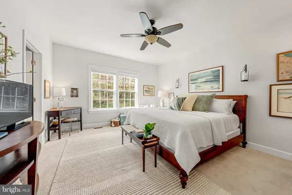 a bed room with a bed and a couch