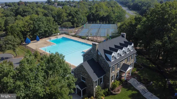 an aerial view of a house with a garden