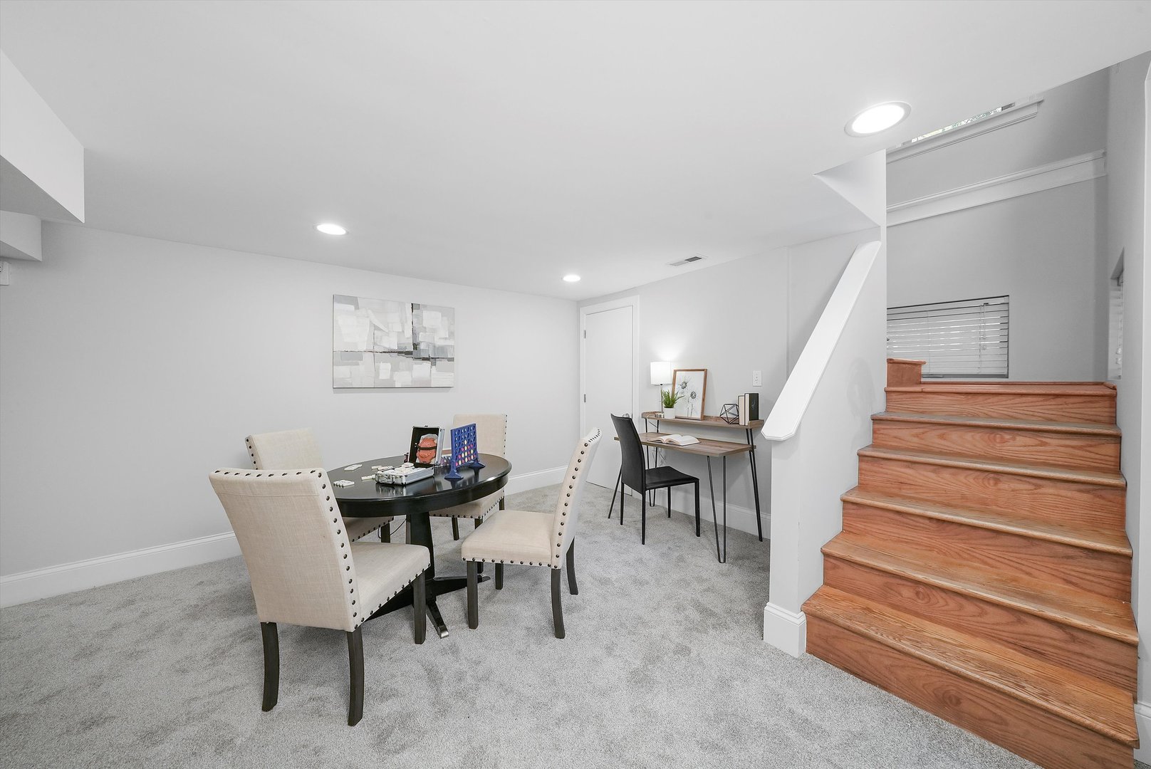 1928 West Addison Street, Unit 1S Chicago, IL 60613 - Photo 14 of 25 a view of a room with lots of furniture and a chandelier
